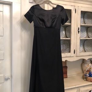 Black formal size 4. Cute back detail.